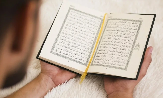 Man Reading Quran